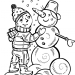 Chłopiec lepiący bałwana