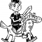 Chłopczyk bawiący się na koniku na...