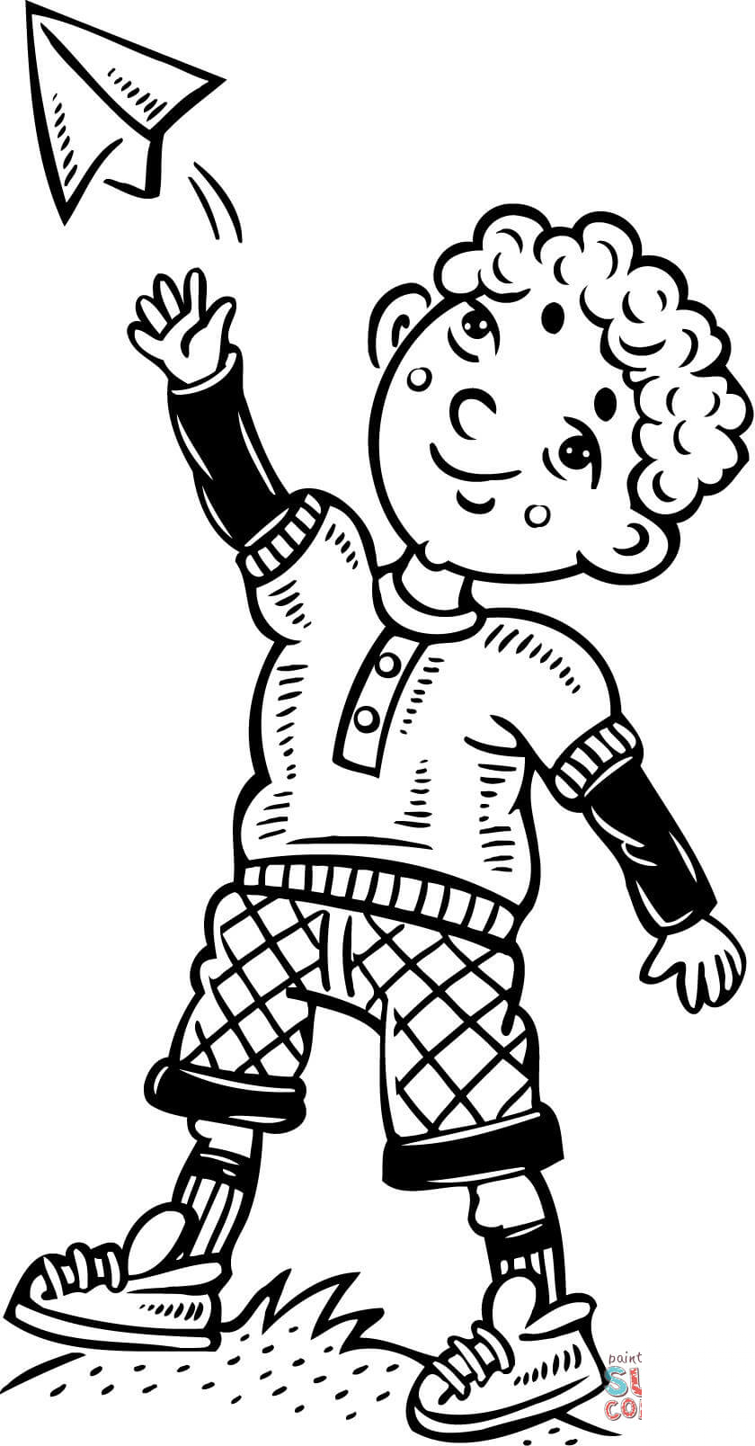 Chłopiec bawiący się samolotem z...