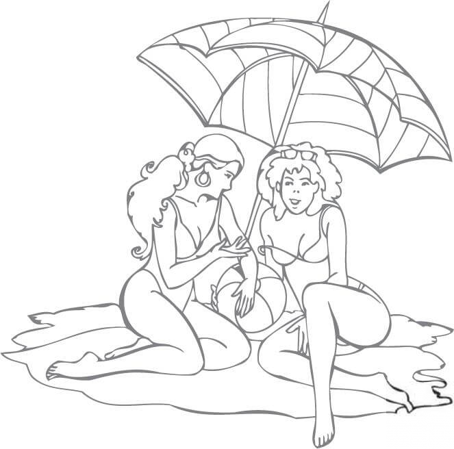 Dwie kobiety na plaży pod parasolem