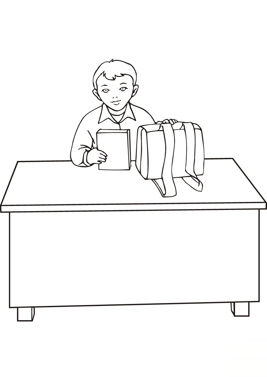 School Boy Sitting at the Desk